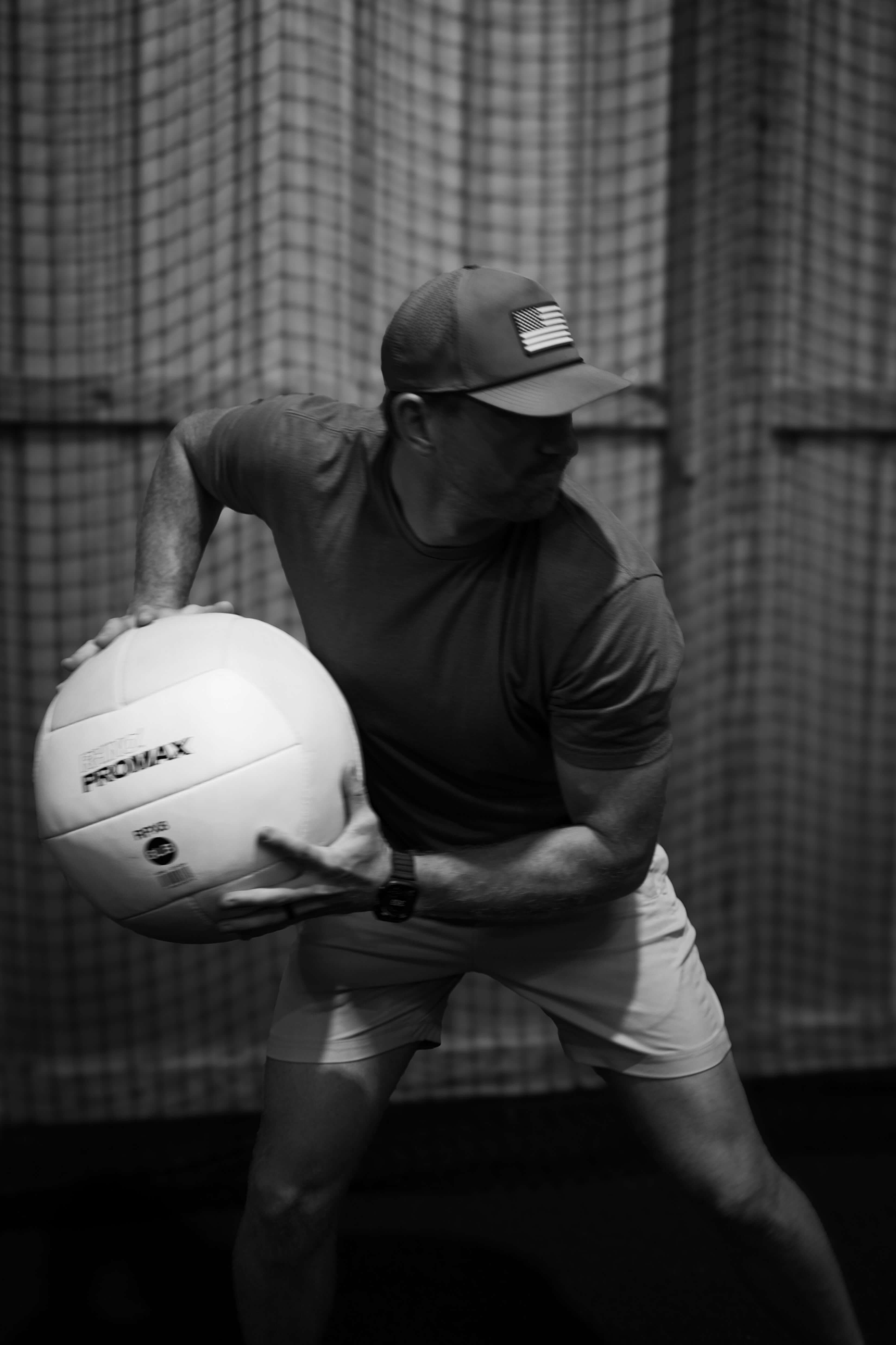 Athlete performing a strength and conditioning lift in the Kingdom Built Performance weight area